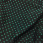 Tessuto Mussola pois verde nero